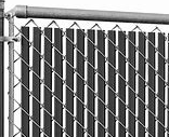 Black vertical privacy slats woven through chain link